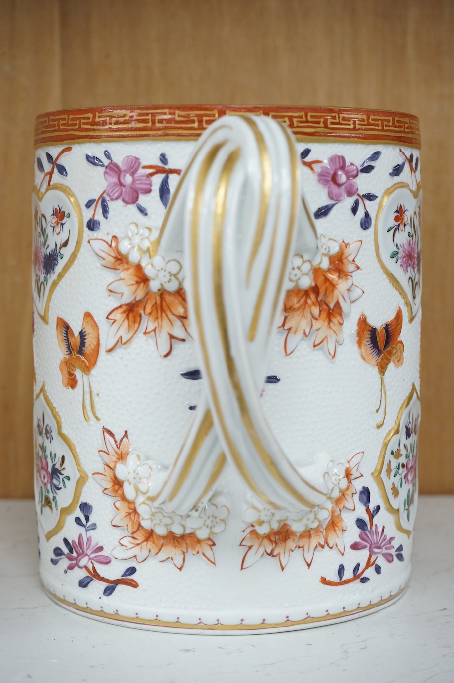 A Samson, Paris mug in Chinese export style and a Copeland Spode toby jug, Samson mug 14.5cm high.